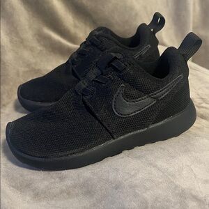 Nike All-Black Athletic Shoes